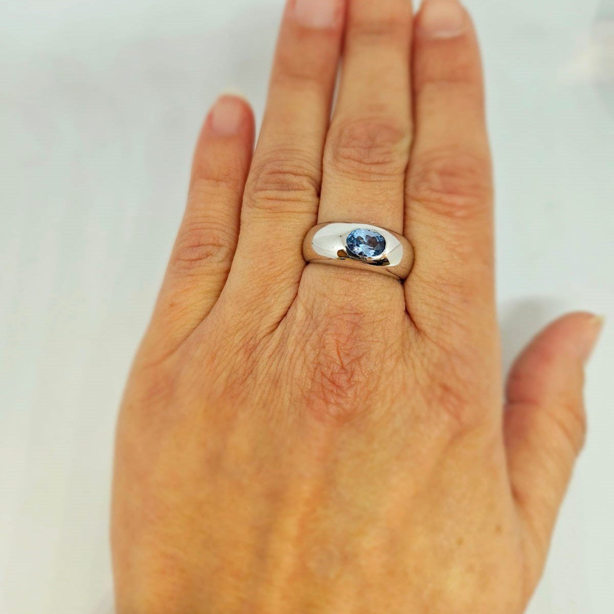 Bague en or blanc 14k avec topaze