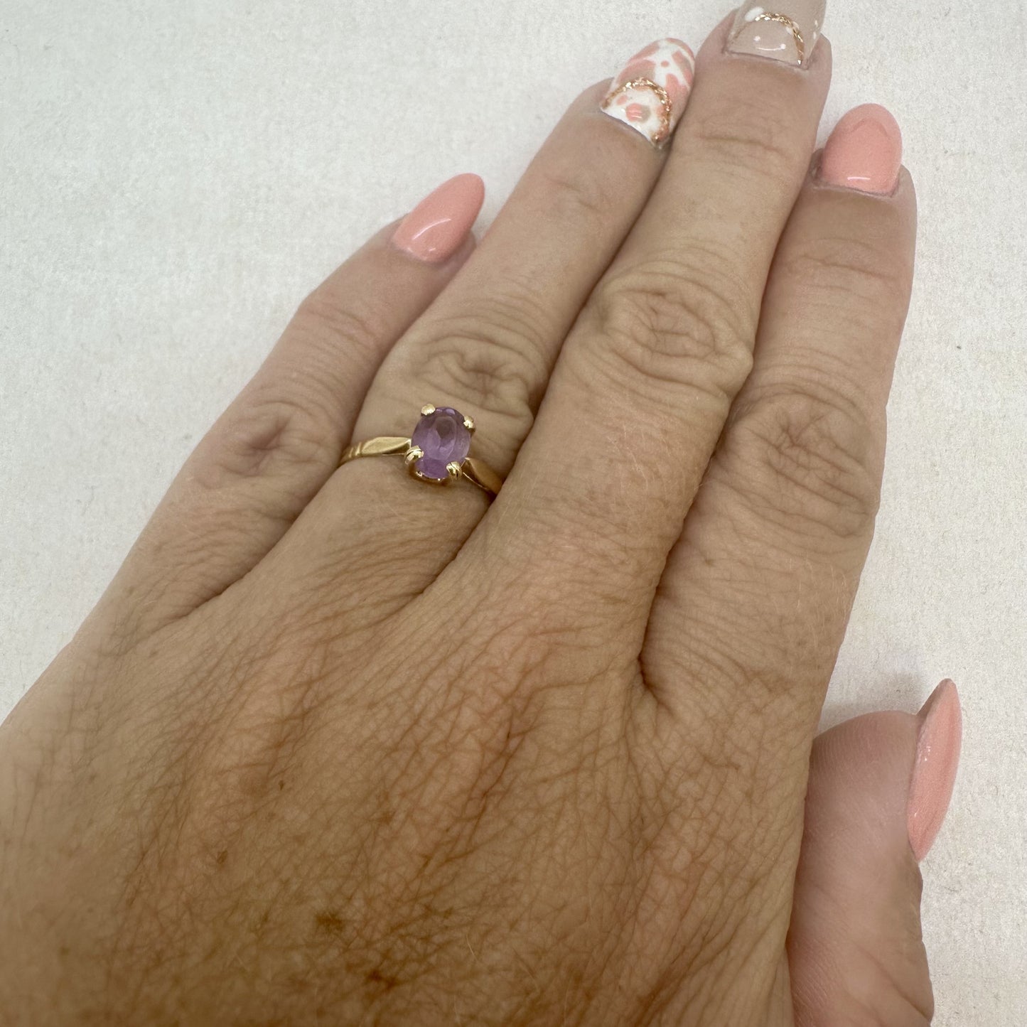 Bague en or jaune et améthyste