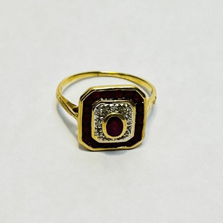 Bague or avec rubis et diamants