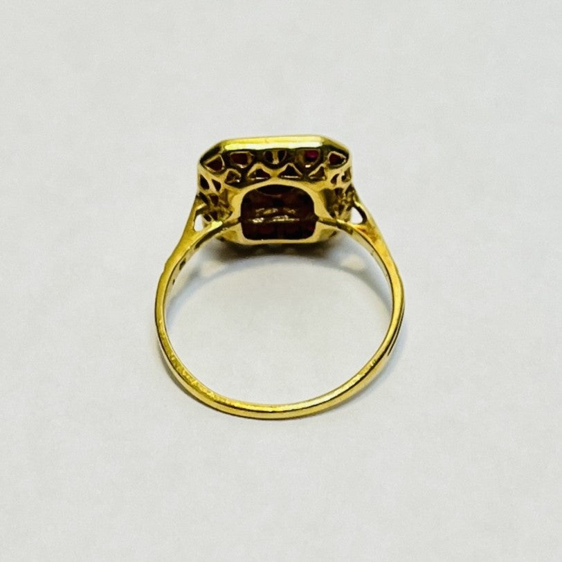 Bague or avec rubis et diamants