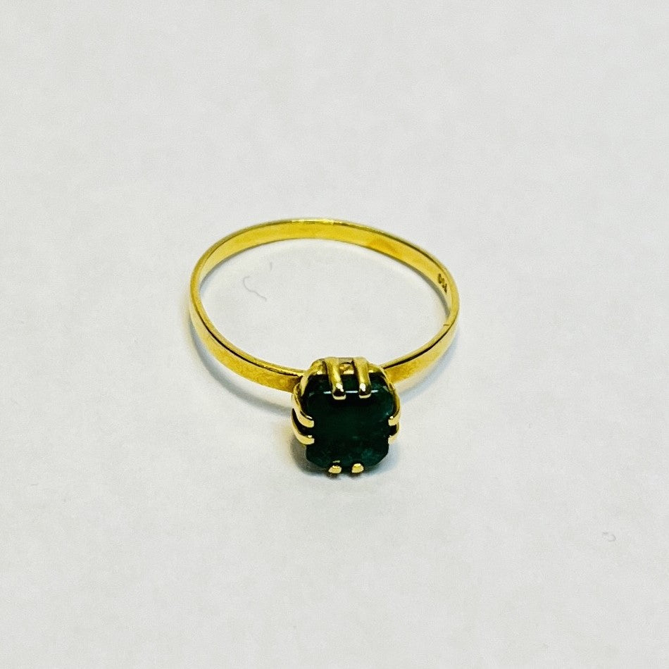 Bague or avec émeraude