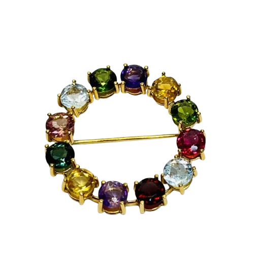 Broche or avec pierres précieuses