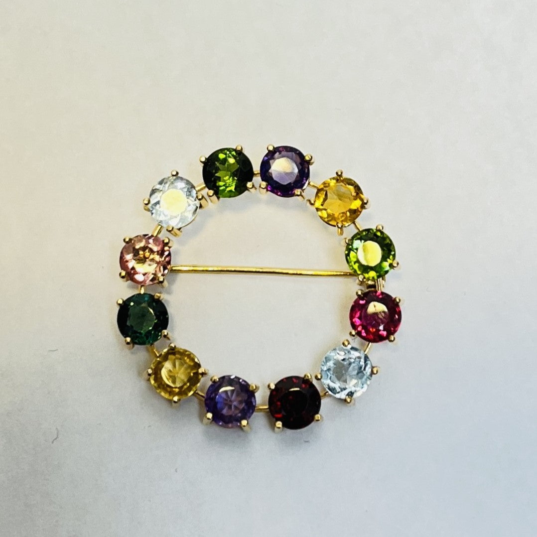 Broche or avec pierres précieuses