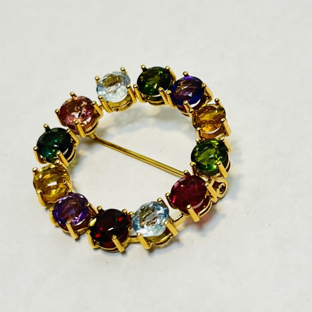Broche or avec pierres précieuses