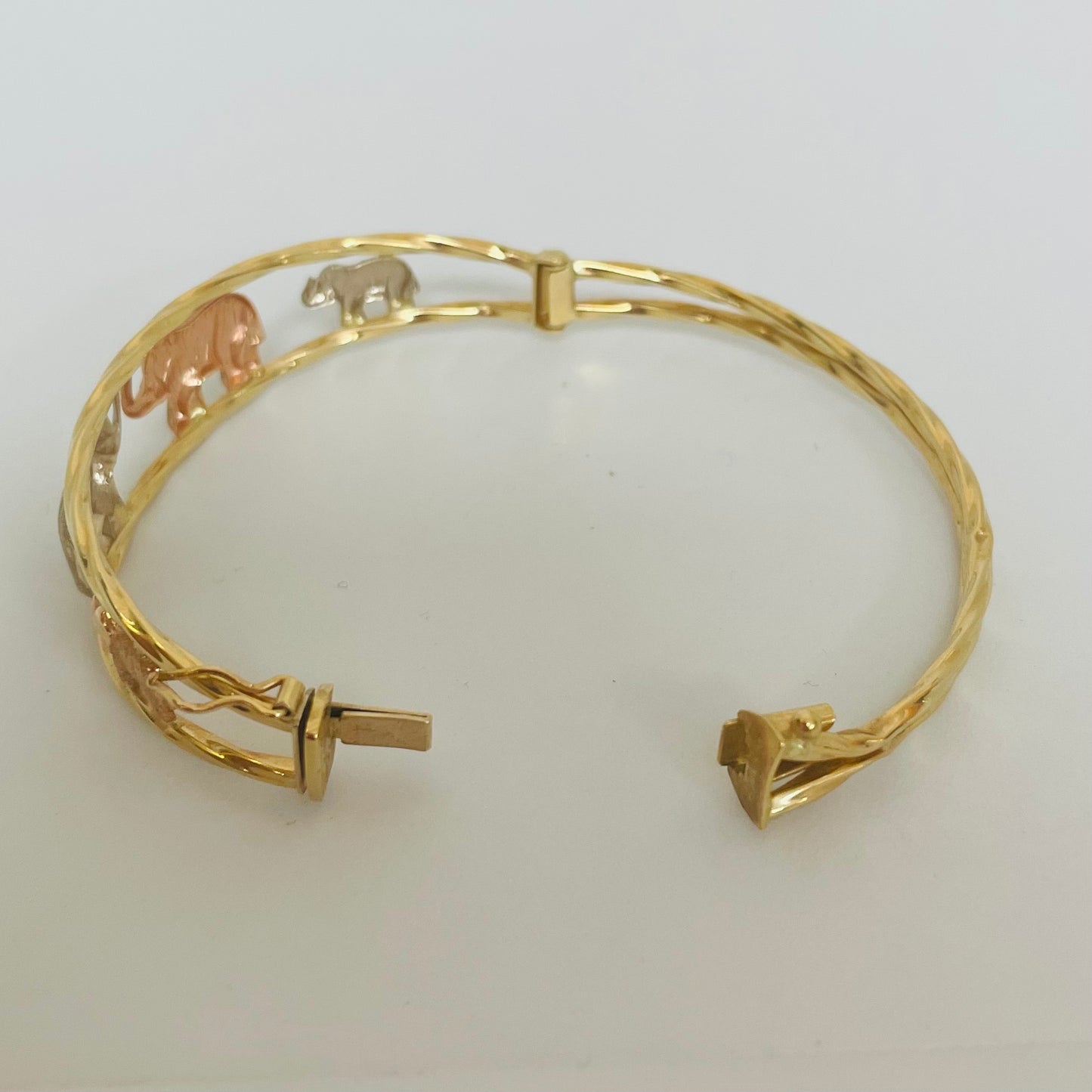 Jonc en 3 ors motif éléphants 18K 5,5cm
