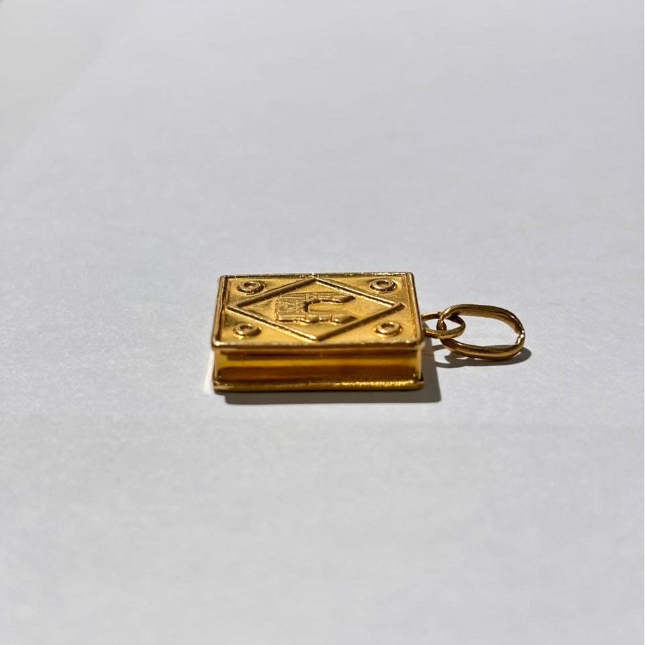 Pendentif symbole en or 18K - 3,35 Grs