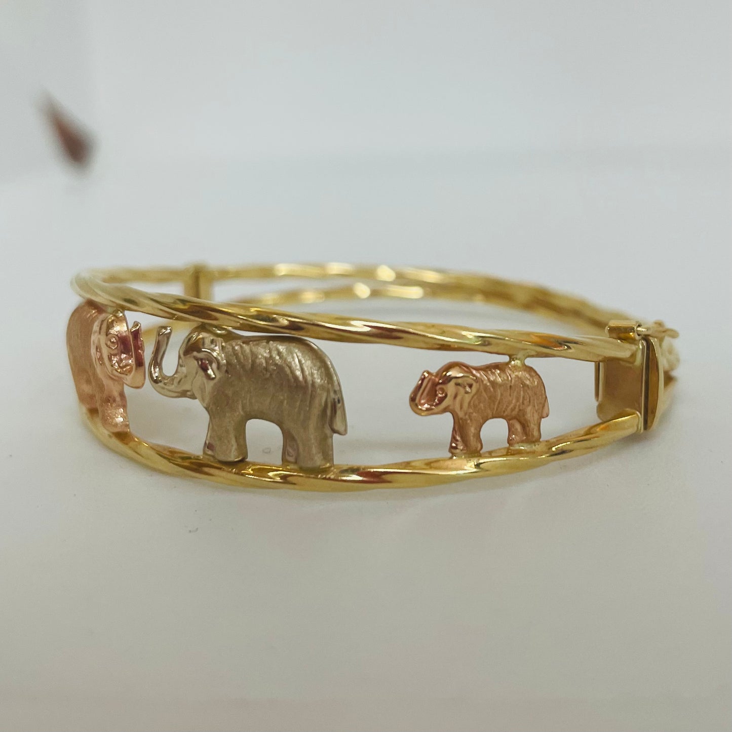 Jonc en 3 ors motif éléphants 18K 5,5cm