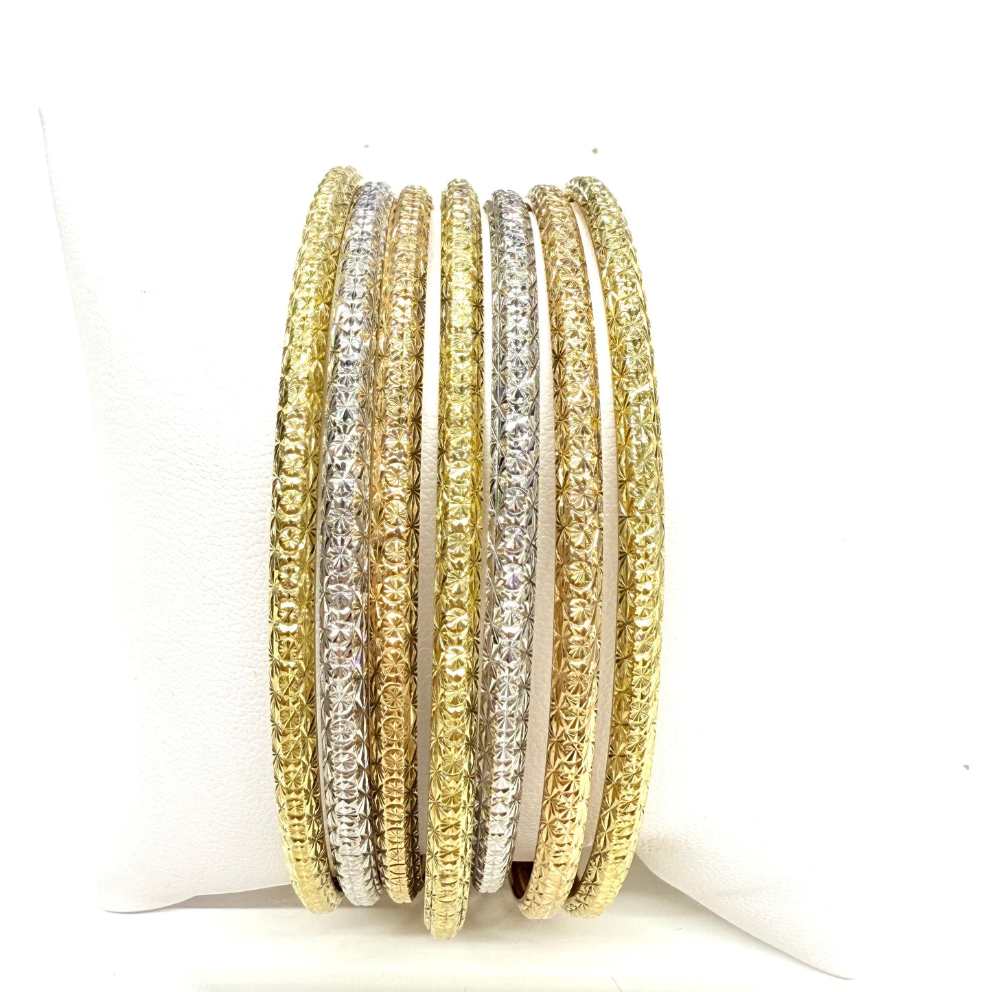 Bracelet Semainier 7 joncs en 3 ors 18 carats - 57.92 Grs