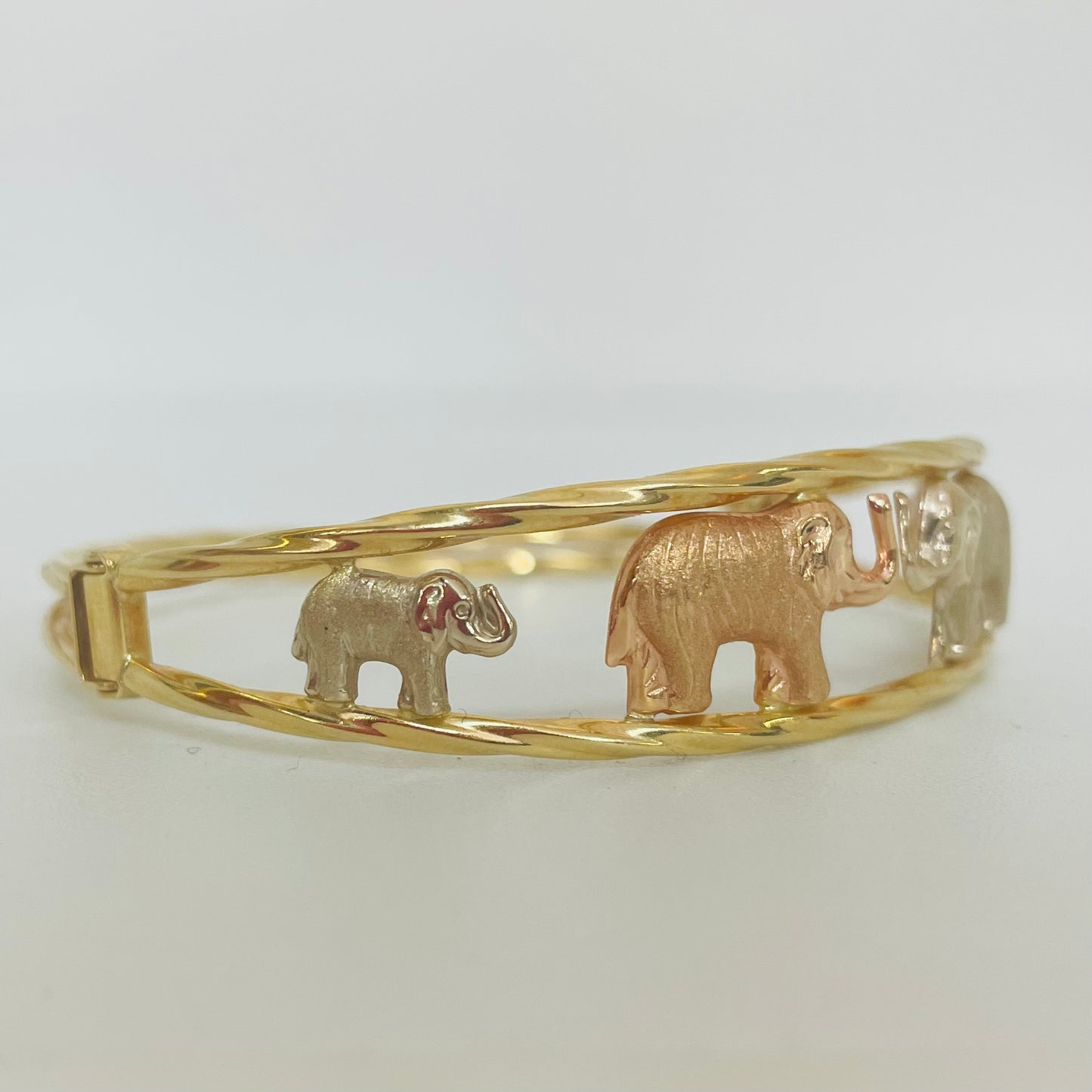 Jonc en 3 ors motif éléphants 18K 5,5cm