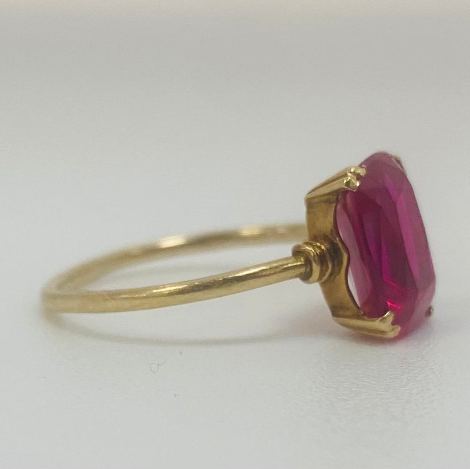 Bague or avec pierre rose