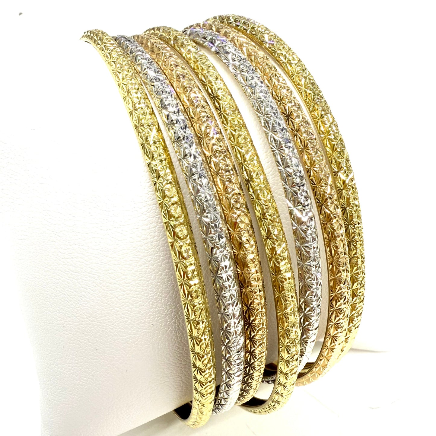 Bracelet Semainier 7 joncs en 3 ors 18 carats - 57.92 Grs