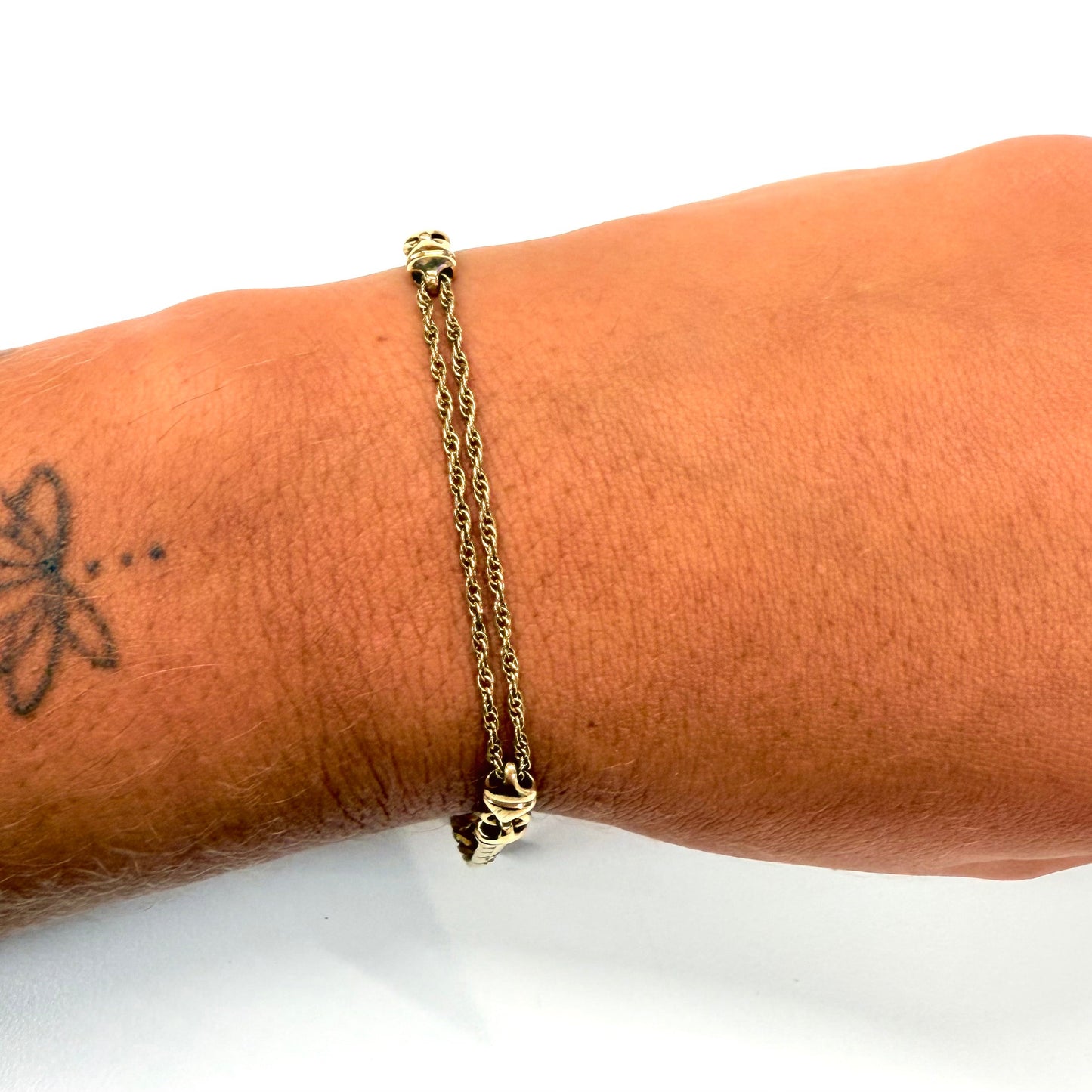 Bracelet en or 18k torsadé et maille anglaise