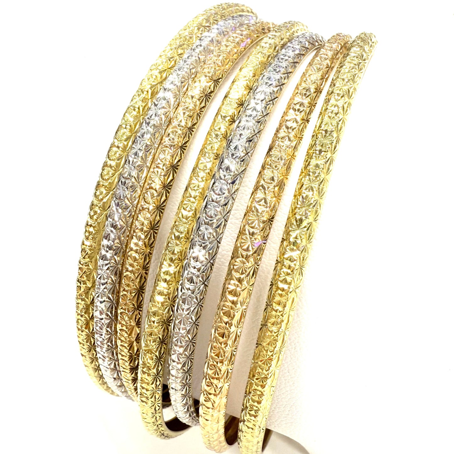 Bracelet Semainier 7 joncs en 3 ors 18 carats - 57.92 Grs