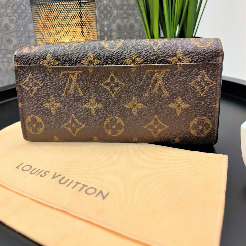 Porte-monnaie et portefeuilles Louis Vuitton en cuir pour femme