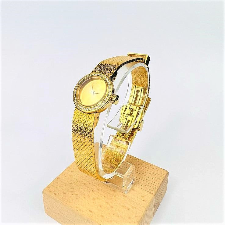 Montre Mini D Dior en or jaune