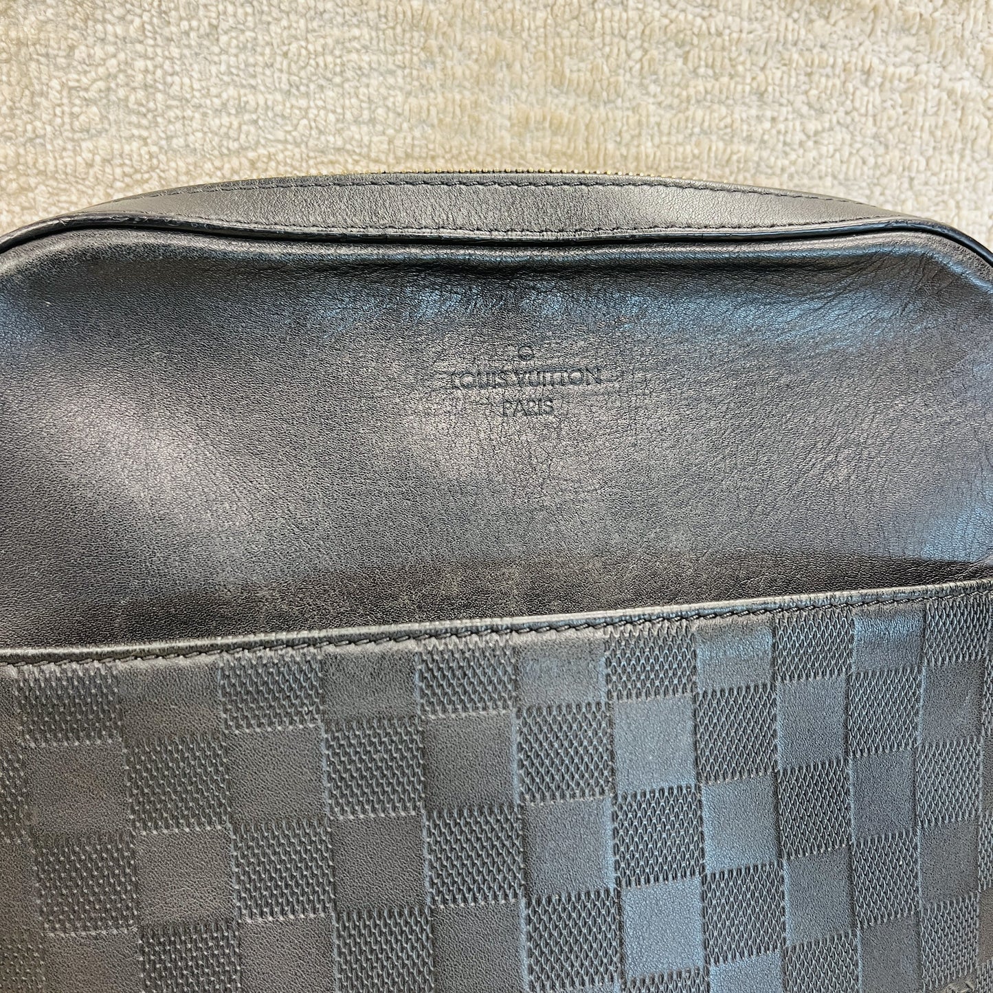 Pochette Louis Vuitton District Infini