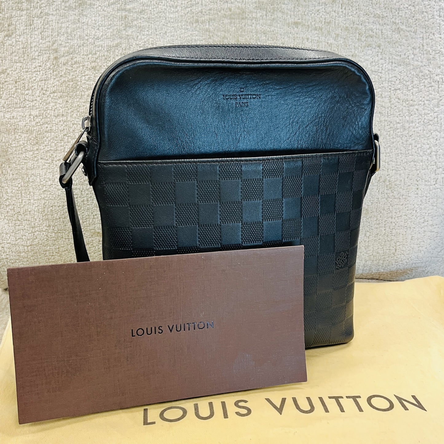 Pochette Louis Vuitton District Infini