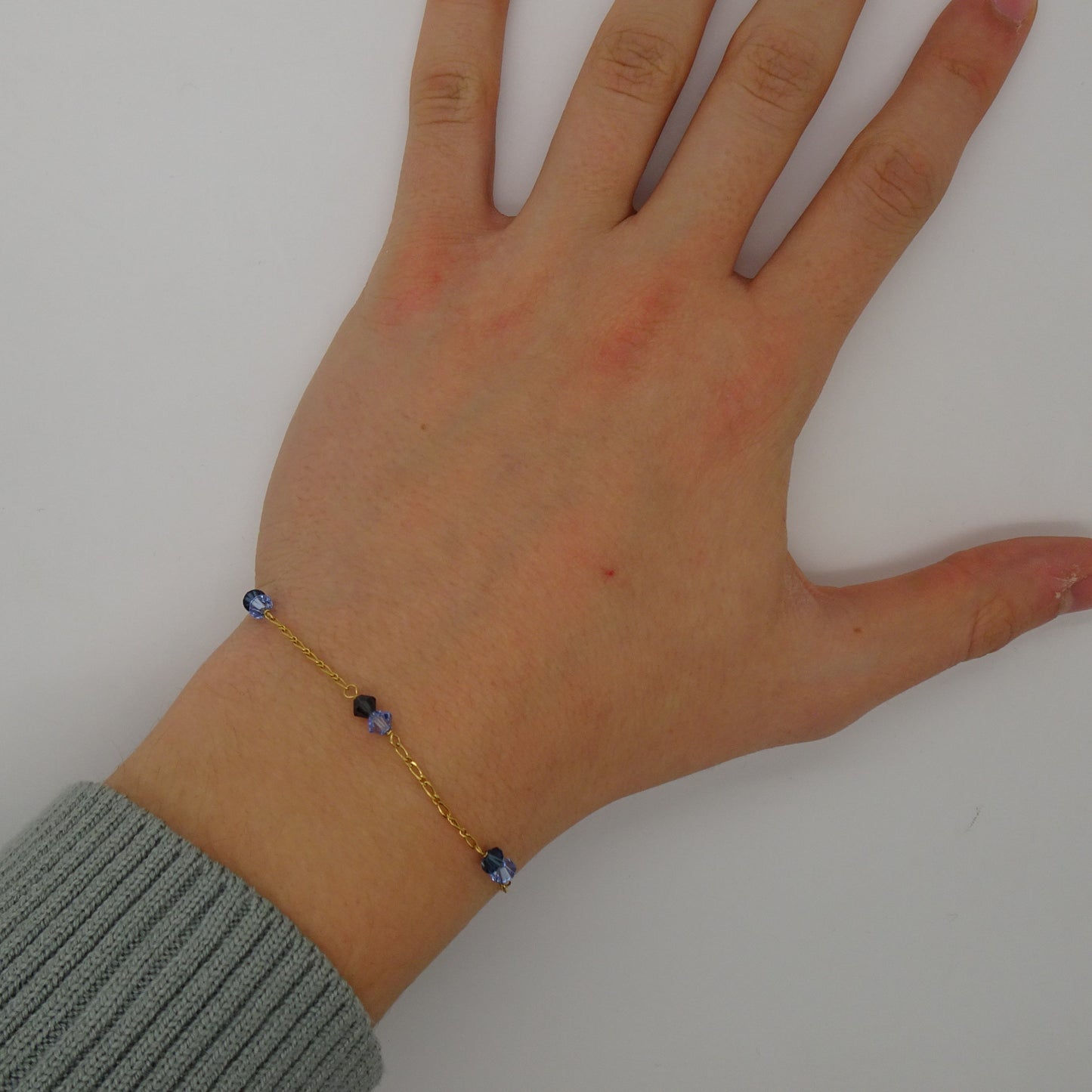 Bracelet or avec pierres bleues