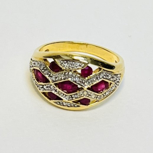 Bague or avec rubis et diamants