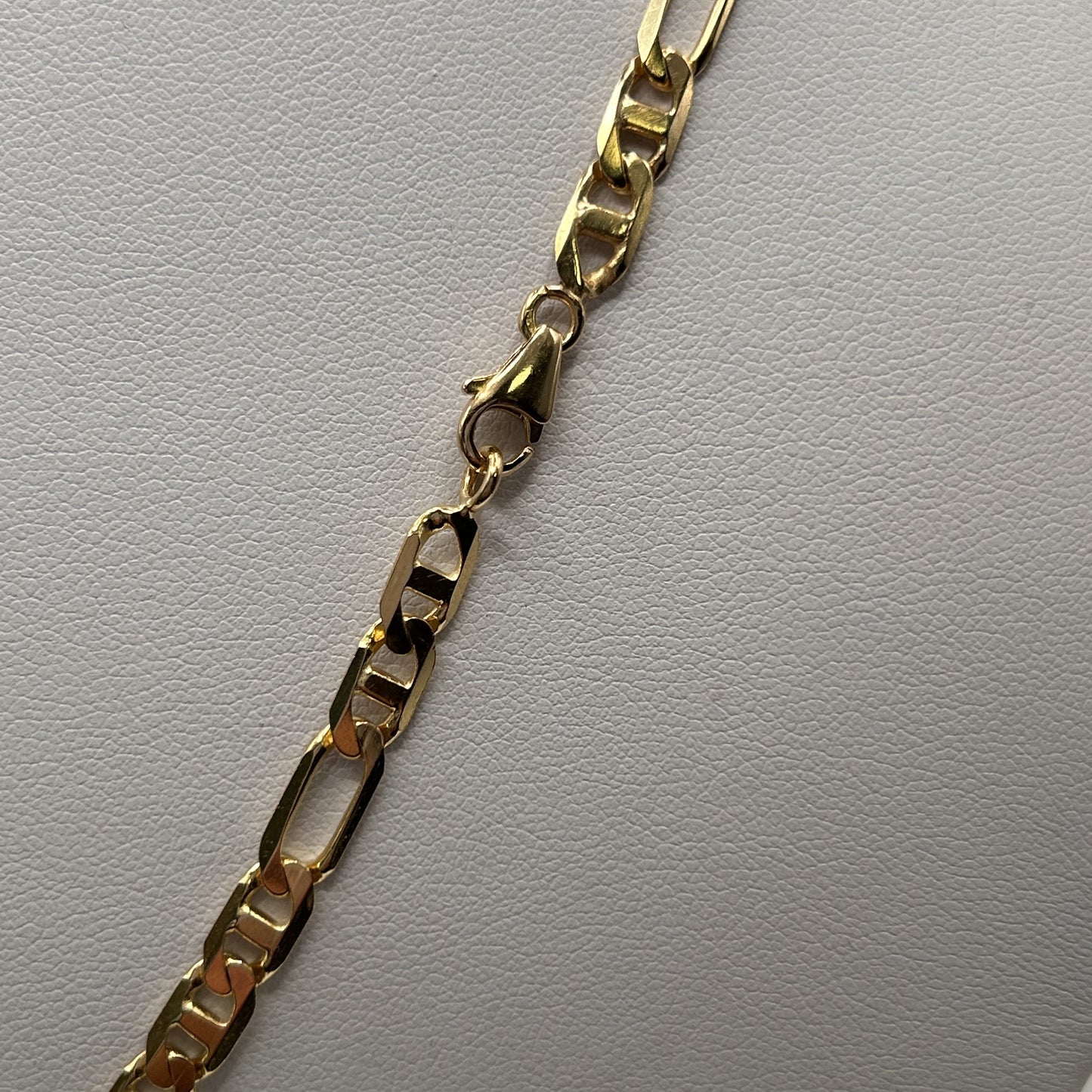 Collier or jaune maille figaro