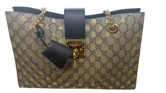 Sac à main Gucci Padlock – Toile siglée beige et cuir noir