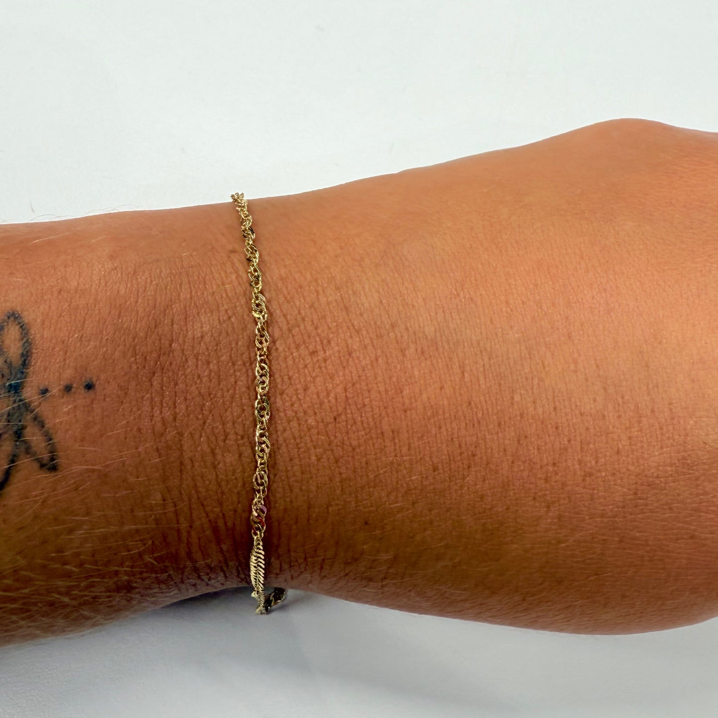 Bracelet torsadé en or jaune 18K - 1.25 Grs