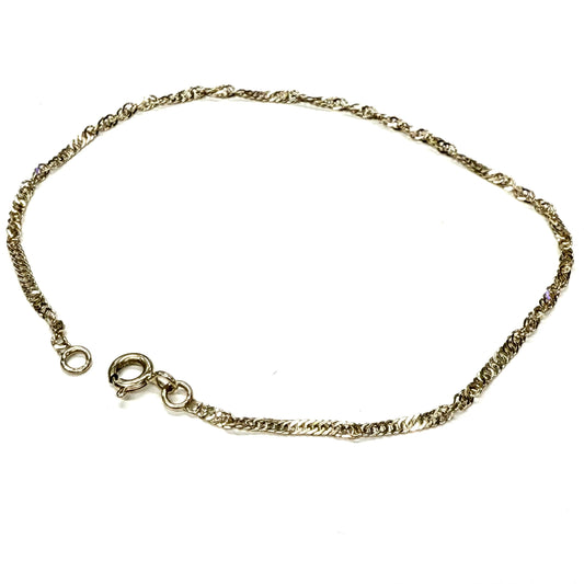 Bracelet torsadé en or jaune 18K - 1.25 Grs